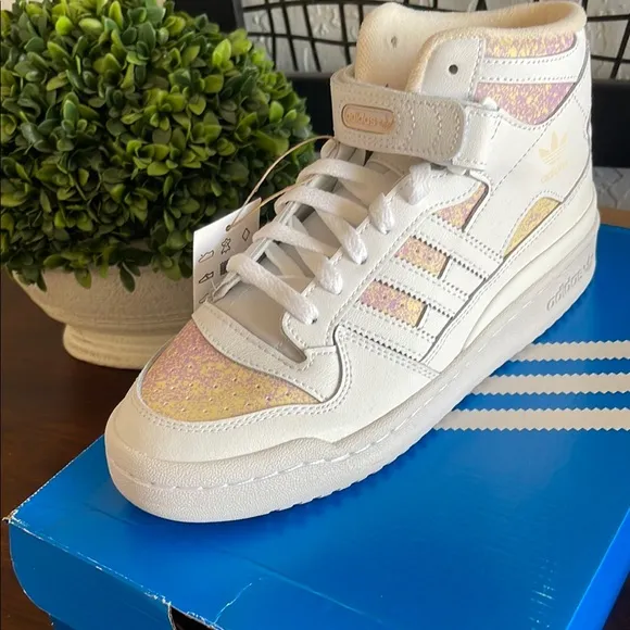Adidas woman’s ' Forum Mid White Sneakers