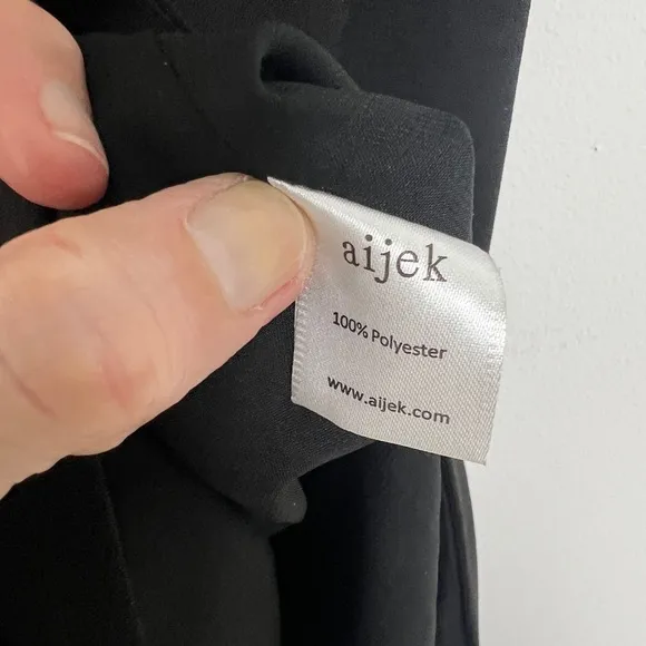 Aijek Black Minimalist Sheer Panel Sleeveless Hi-Lo Hem Knee Length Shift Dress
