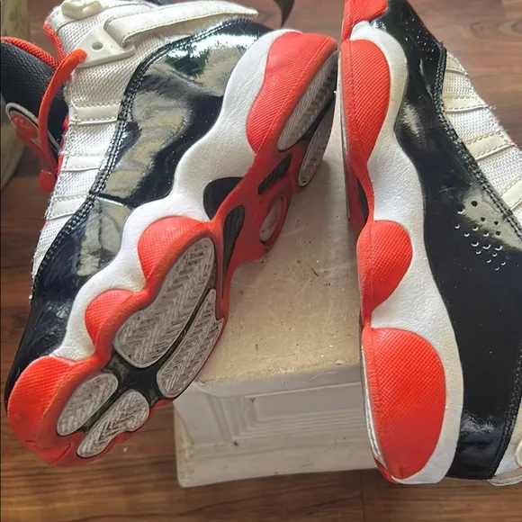 AIR JORDAN Black and Orange Athletic Shoes