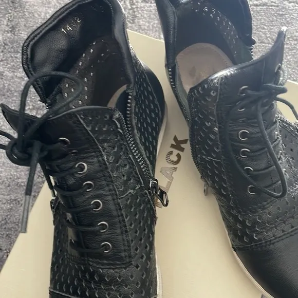 All Black high top perforated zipper shoes 37