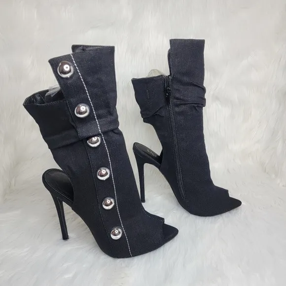 Black boots stiletto heel open toe silver studs.