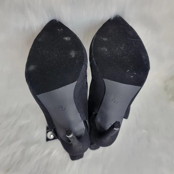 Black boots stiletto heel open toe silver studs.