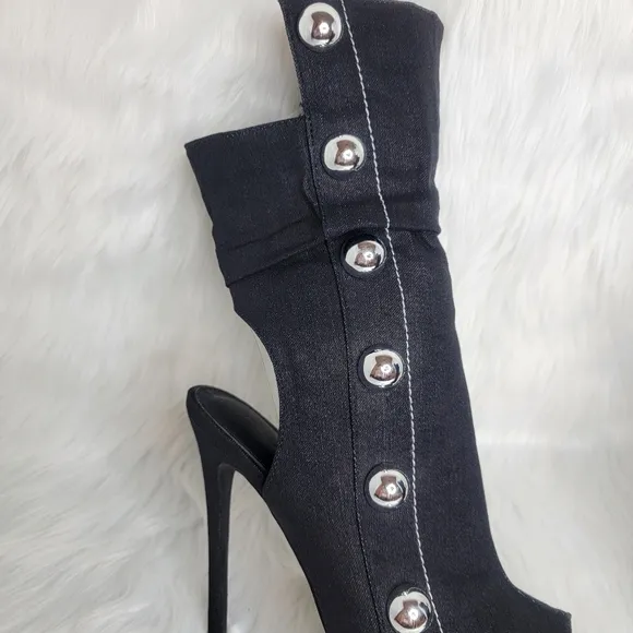 Black boots stiletto heel open toe silver studs.