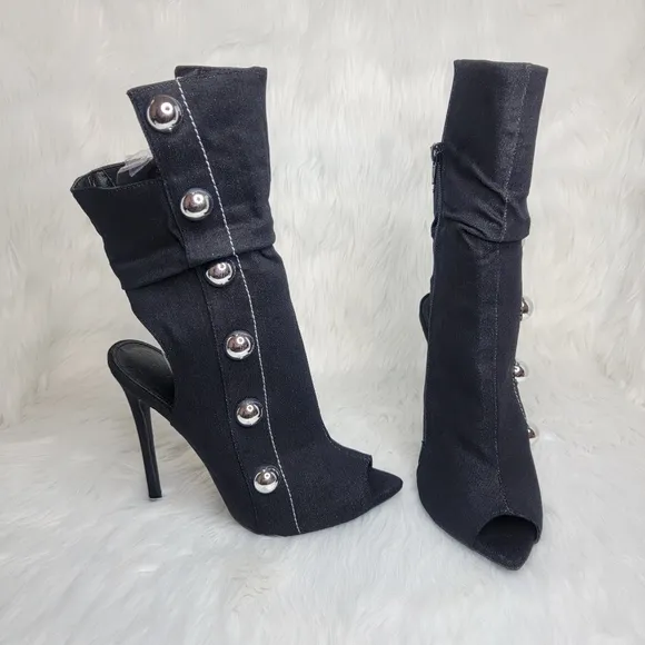 Black boots stiletto heel open toe silver studs.