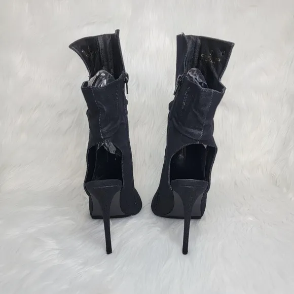 Black boots stiletto heel open toe silver studs.
