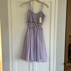 Brand new Marlo kids size 13-14 lavender dress