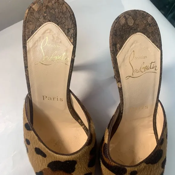 Christian Louboutin Leopard Print Women's Shoes. Heel tips are metal on purpose