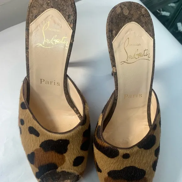 Christian Louboutin Leopard Print Women's Shoes. Heel tips are metal on purpose