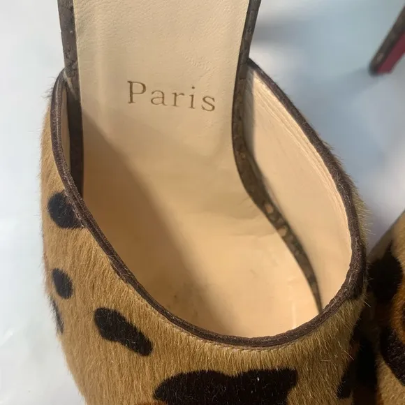Christian Louboutin Leopard Print Women's Shoes. Heel tips are metal on purpose