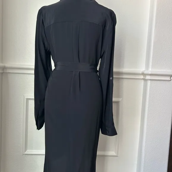 Elaine Turner NWT dress with tie belt, color black size large. Quite luxury.
