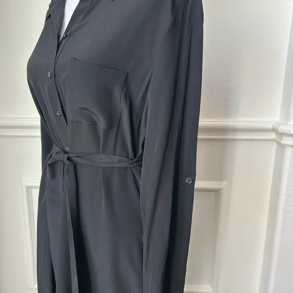 Elaine Turner NWT dress with tie belt, color black size large. Quite luxury.