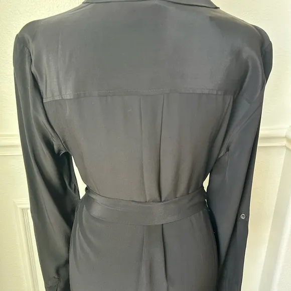 Elaine Turner NWT dress with tie belt, color black size large. Quite luxury.