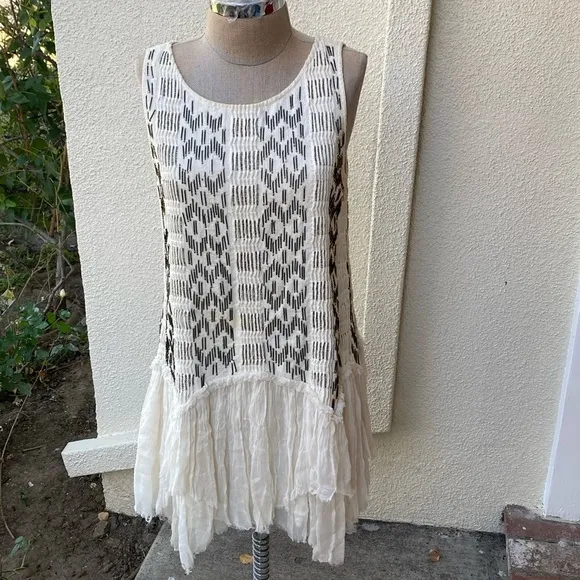 Free People stunning bead embellished dress from luxury boutique in Laguna