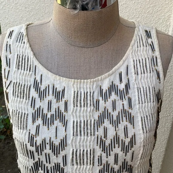 Free People stunning bead embellished dress from luxury boutique in Laguna