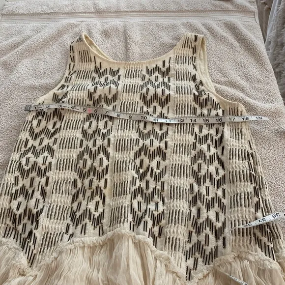 Free People stunning bead embellished dress from luxury boutique in Laguna