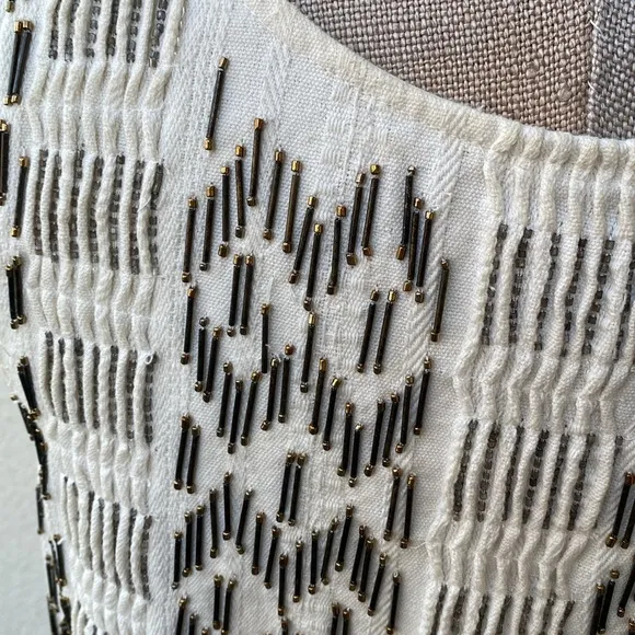 Free People stunning bead embellished dress from luxury boutique in Laguna