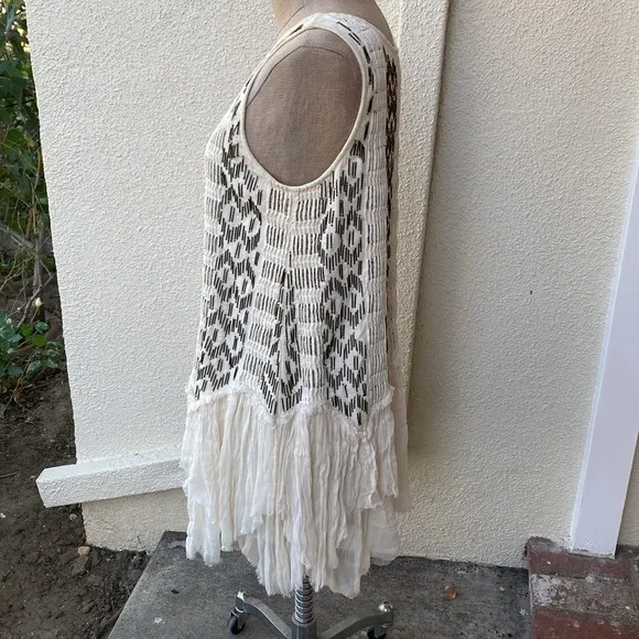 Free People stunning bead embellished dress from luxury boutique in Laguna