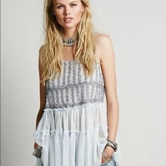 Free People stunning bead embellished dress from luxury boutique in Laguna