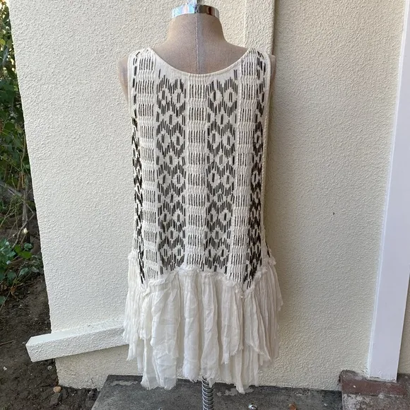 Free People stunning bead embellished dress from luxury boutique in Laguna