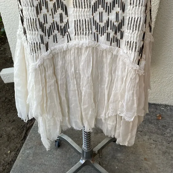Free People stunning bead embellished dress from luxury boutique in Laguna