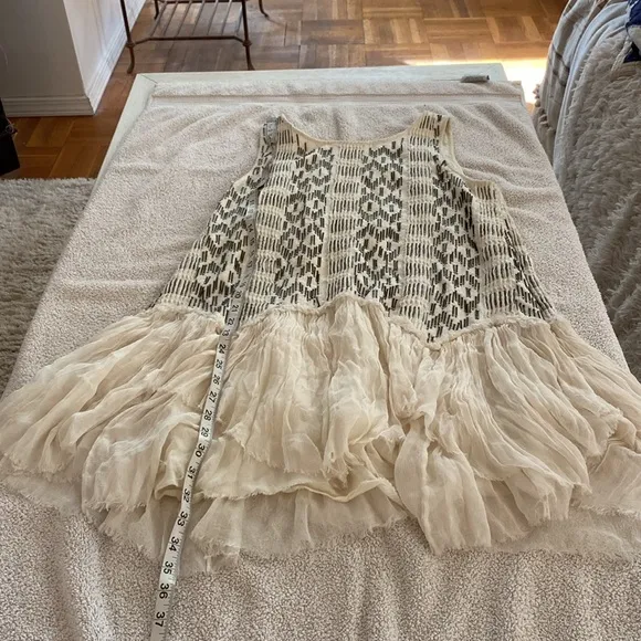 Free People stunning bead embellished dress from luxury boutique in Laguna