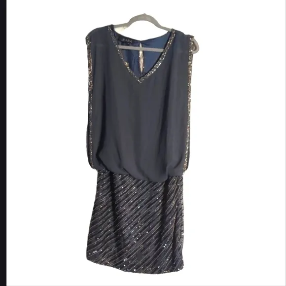 Grey jkara high end luxury cocktail dress.