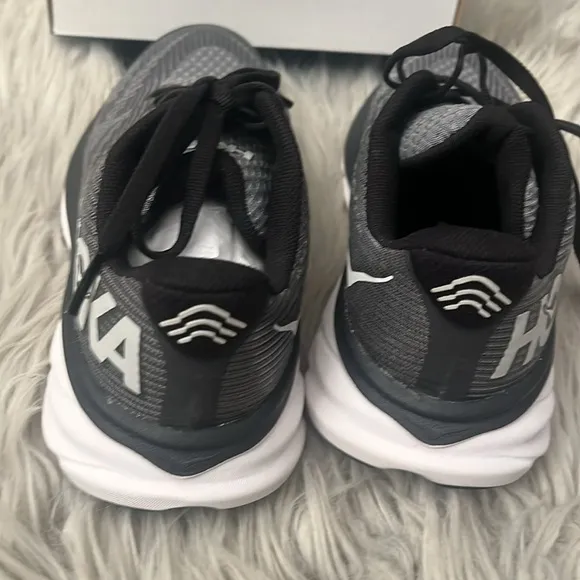 Hoka NIB Black Clifton 9 youth size 4