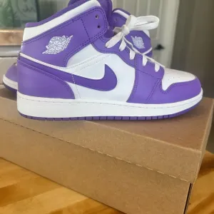 Jordan 1 Nike Vibrant Purple Athletic Shoes