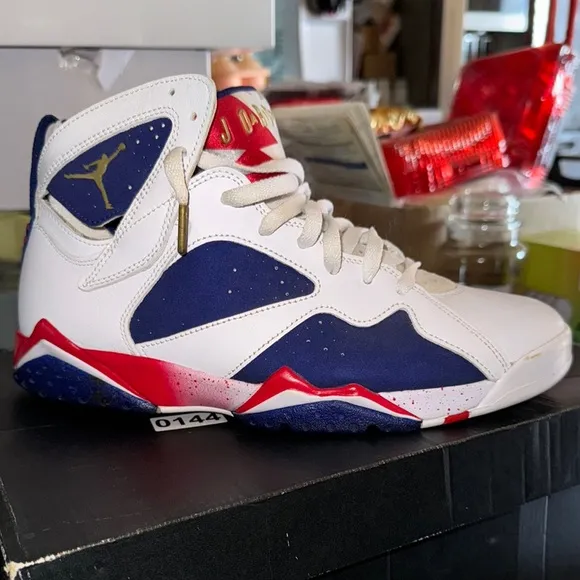 Jordan White and Blue Athletic Shoes with Geometric Design
