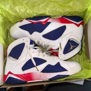 Jordan White and Blue Athletic Shoes with Geometric Design