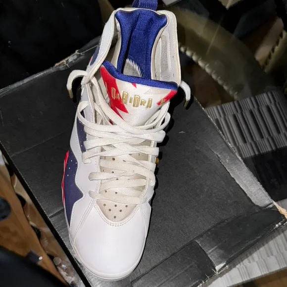 Jordan White and Blue Athletic Shoes with Geometric Design