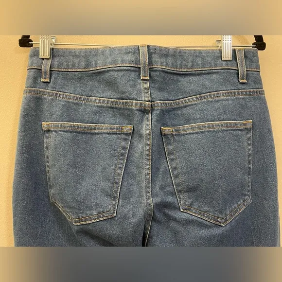 Khaite The Benny Crop Flare Jeans in Mid-Wash Blue - 29‎