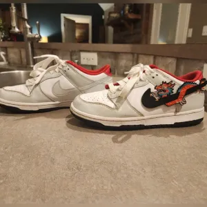 Kids White and Red Sneakers Nike Dunk Low GS &quot;Year of the Dragon&quot; edition. 7Y