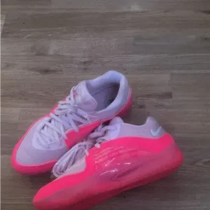 Neon Pink and White Athletic Shoes
