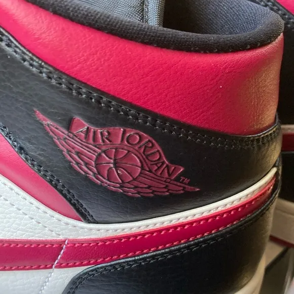 Nike Black and Pink High-Top Athletic Shoes