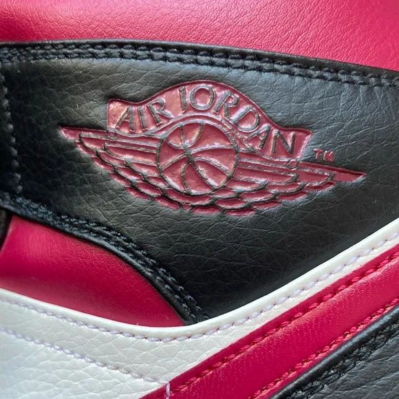 Nike Black and Pink High-Top Athletic Shoes