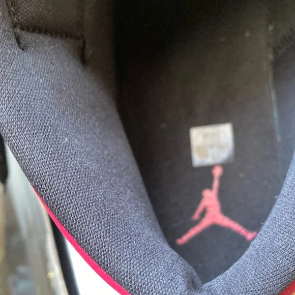 Nike Black and Pink High-Top Athletic Shoes