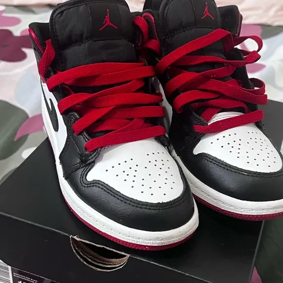 Nike Black and Red Sneakers with Iconic Swoosh and High Ankle Design