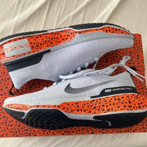 Nike Invincible Run Flyknit Shoes - White and Orange