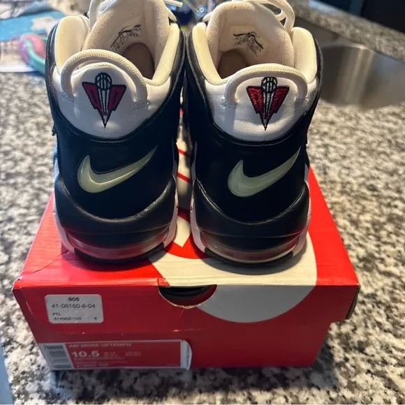 Nike mens Air More Uptempo Black and White Shoes