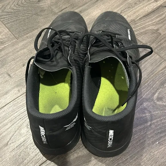 Nike mercurial indoor soccer shoes.