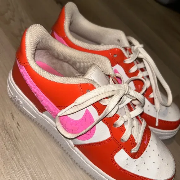 Nike Orange and Pink Sneakers with Bold Design