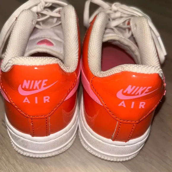 Nike Orange and Pink Sneakers with Bold Design