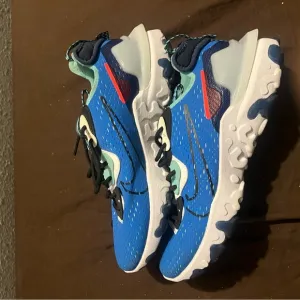 Nike React Vision Photo Blue fits ladies size 10.5