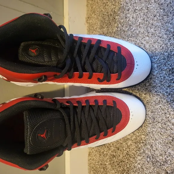 Nike Red and Black Sneakers with Classic Silhouette