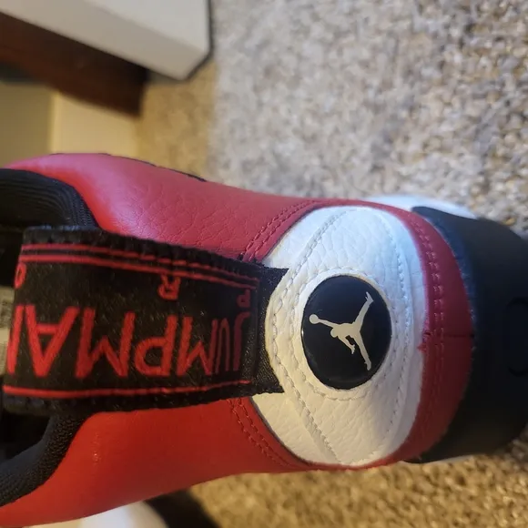 Nike Red and Black Sneakers with Classic Silhouette