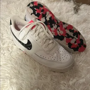 Nike Women's Court Vision White and Black Sneakers