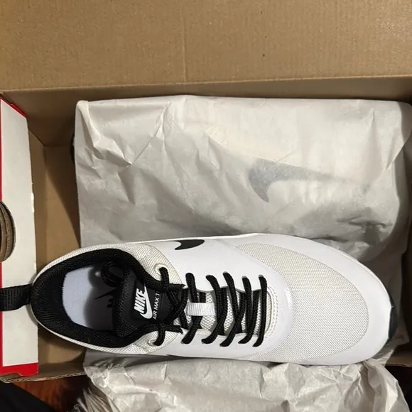 Nike Women’s White and Black Sneakers