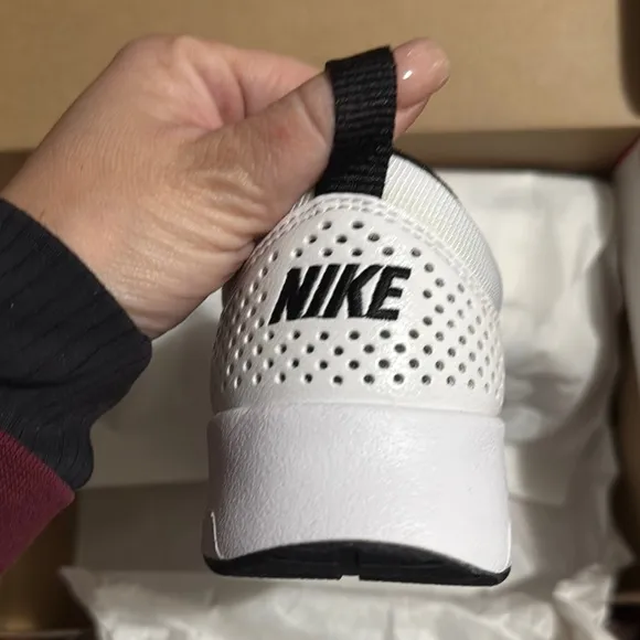 Nike Women’s White and Black Sneakers