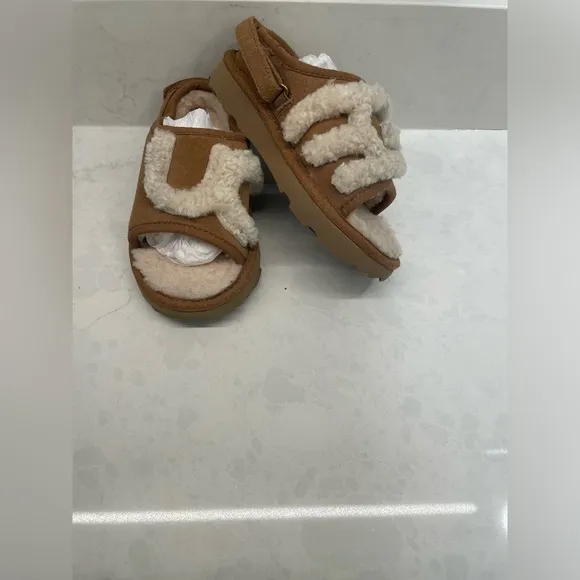 UGG Slide Slippers Chestnut kids size 9.